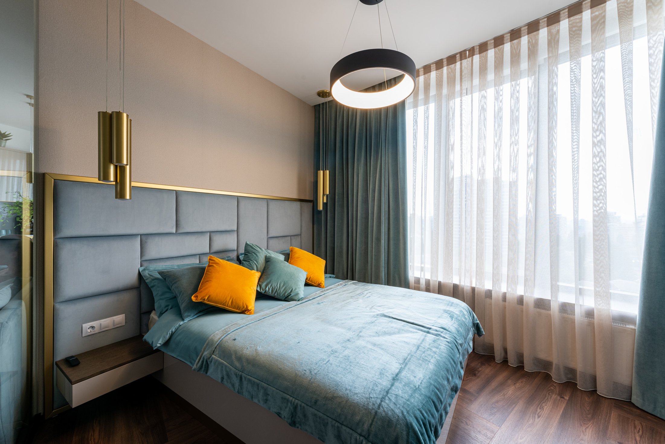 Interior of bedroom with stylish bed
